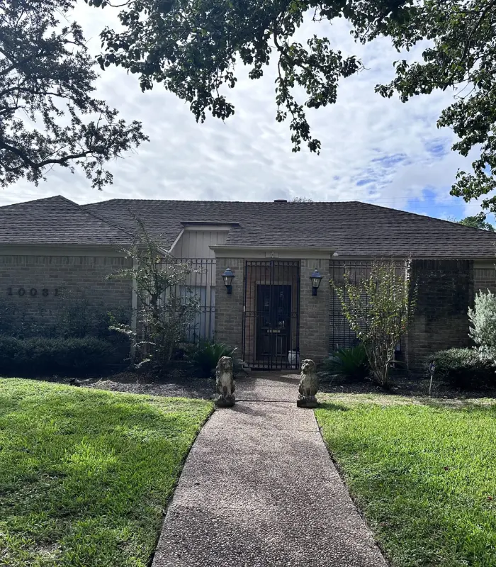 Exterior of Rochelle St rental home in Sam Mellon, Richmond TX near Rosenberg, sold by a tired landlord, closed for cash as-is by Volcan Property Buyers