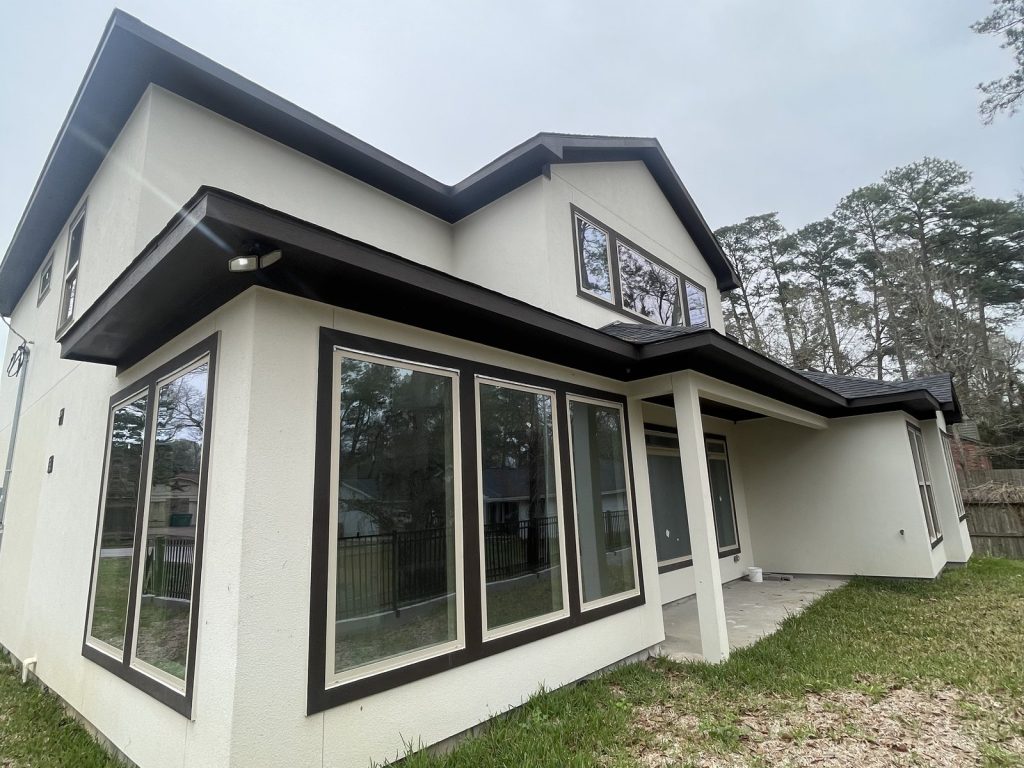 Rear exterior of a rebuilt home in Panorama, Conroe TX near Lake Conroe