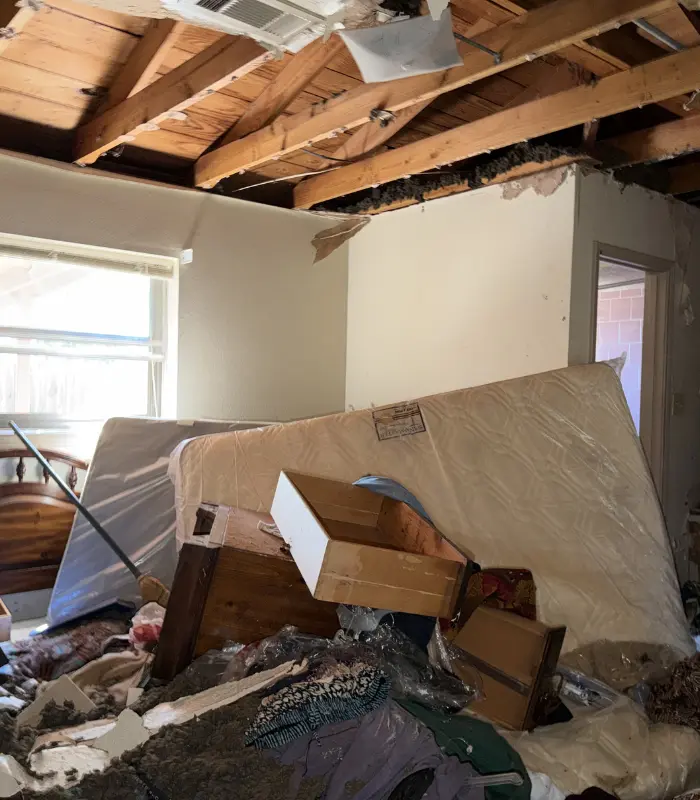 Baytown house with severe interior ceiling damage requiring extensive renovation