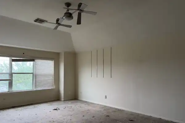 Interior of distressed Bridgestone Pine Court rental property requiring major repairs after tenant occupancy