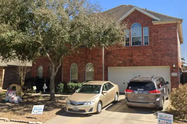 Front exterior of Bridgestone Pine Court property purchased from a tired landlord in Houston