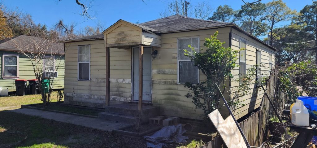 As-is rental home with aging siding bought for cash in Bayou Vista Terrace, Baytown TX