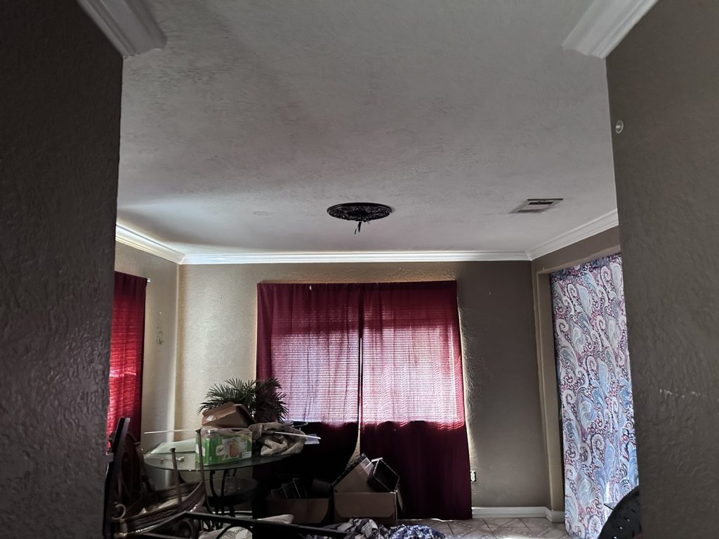 Dining room of inherited Baytown TX home purchased as-is by cash home buyers