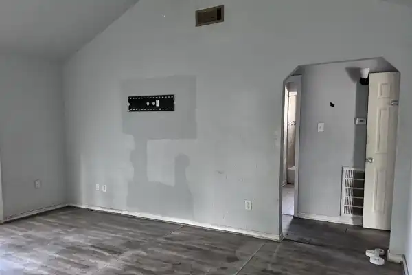 Interior of abandoned inherited Houston property requiring significant repairs