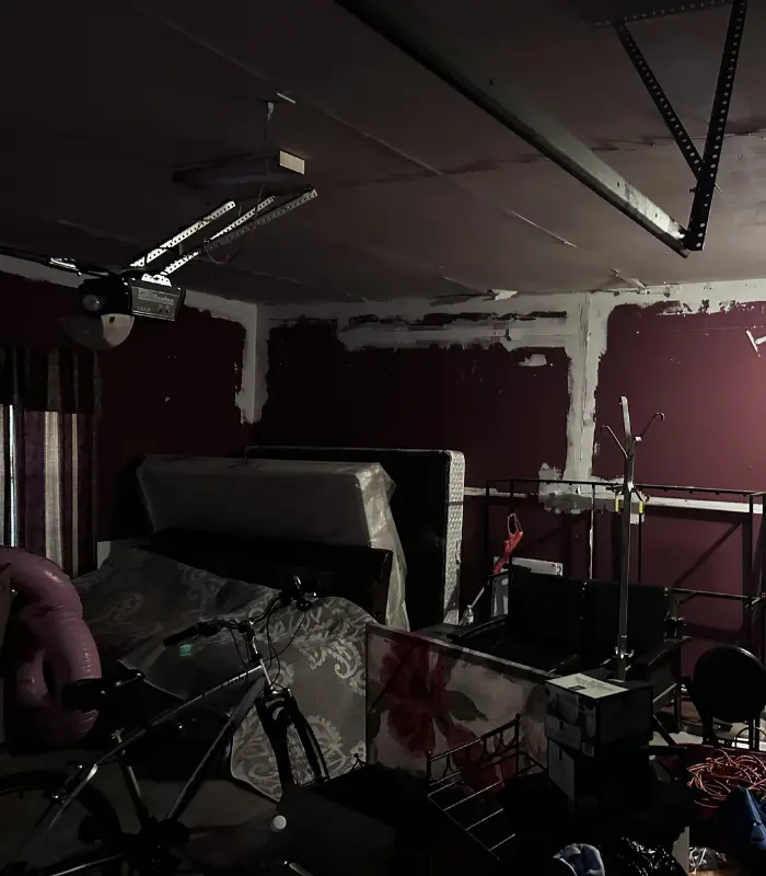 Stafford garage interior showing damage and cleanup needs before listing on the market