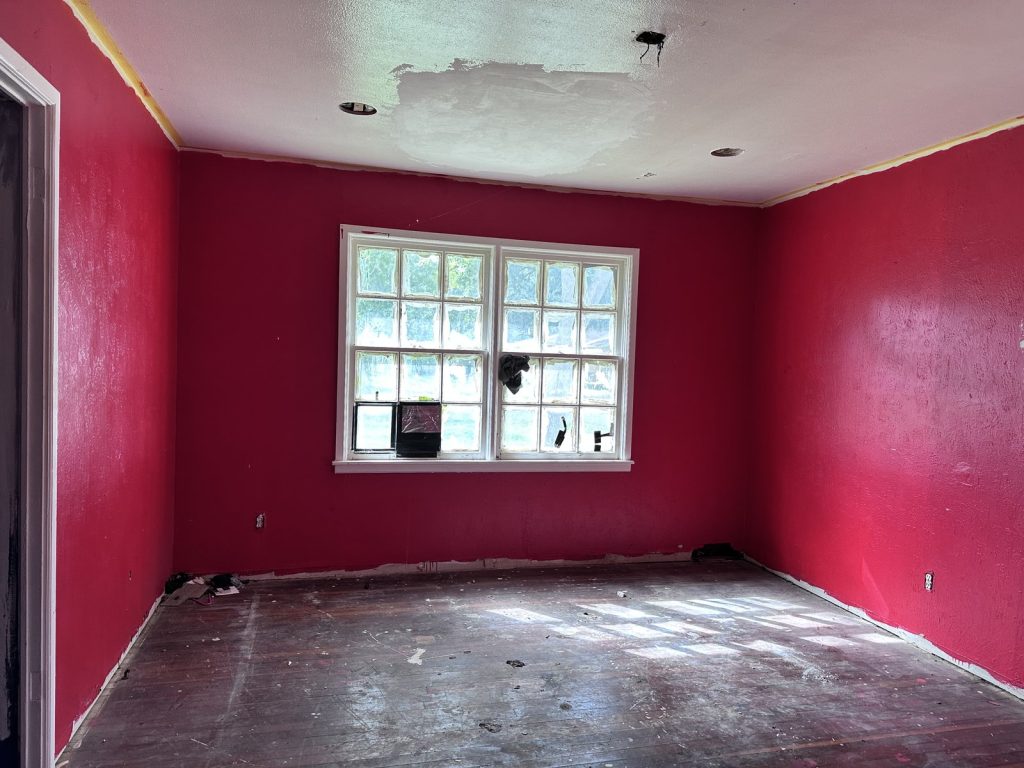 Stripped room with damaged ceiling in as-is home bought for cash in La Marque TX