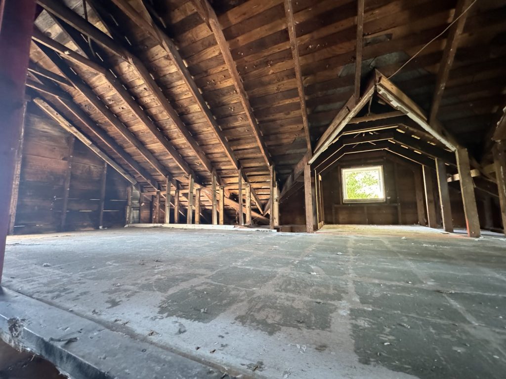 Original heavy timber roof framing in attic of as-is home bought in North Texas City, Texas City TX
