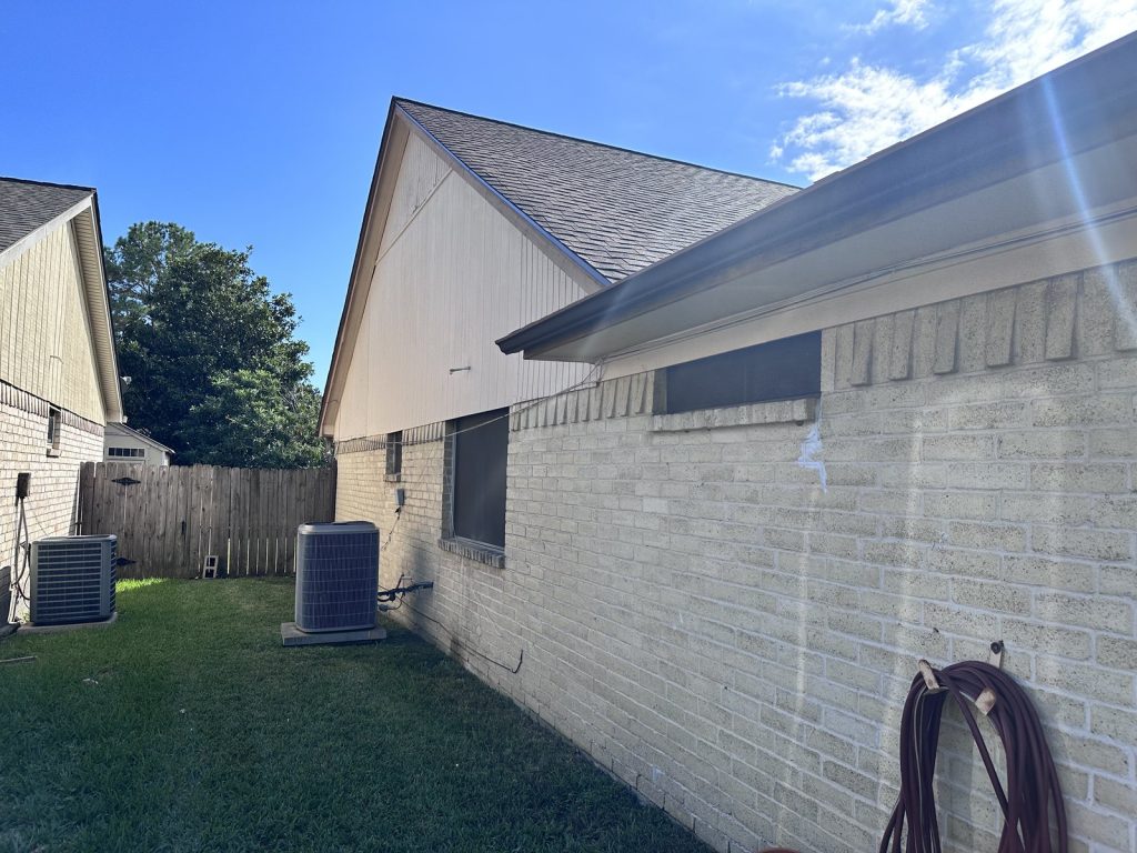 Side exterior of a Sandpiper-area home in Spring, TX bought as-is for cash