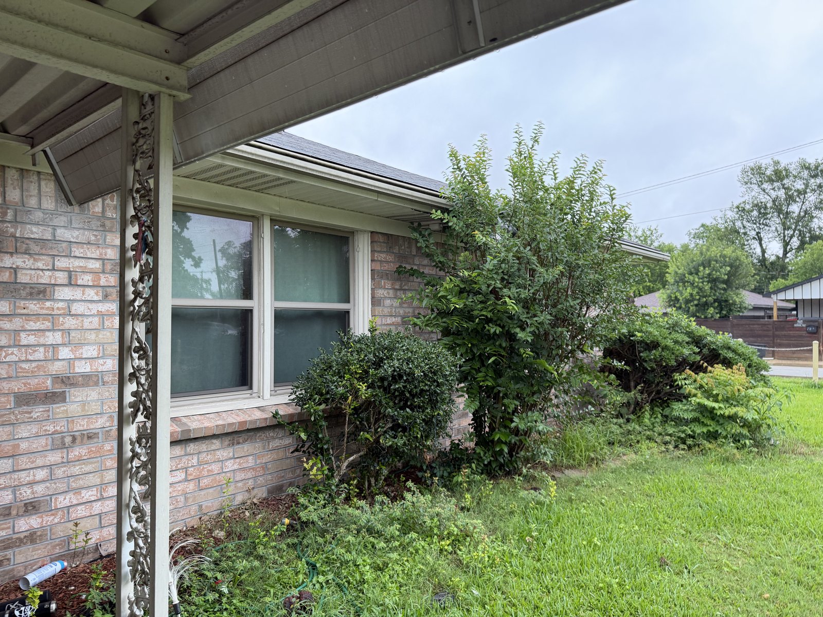 Front view of as-is brick home bought for cash in South Park, Houston TX