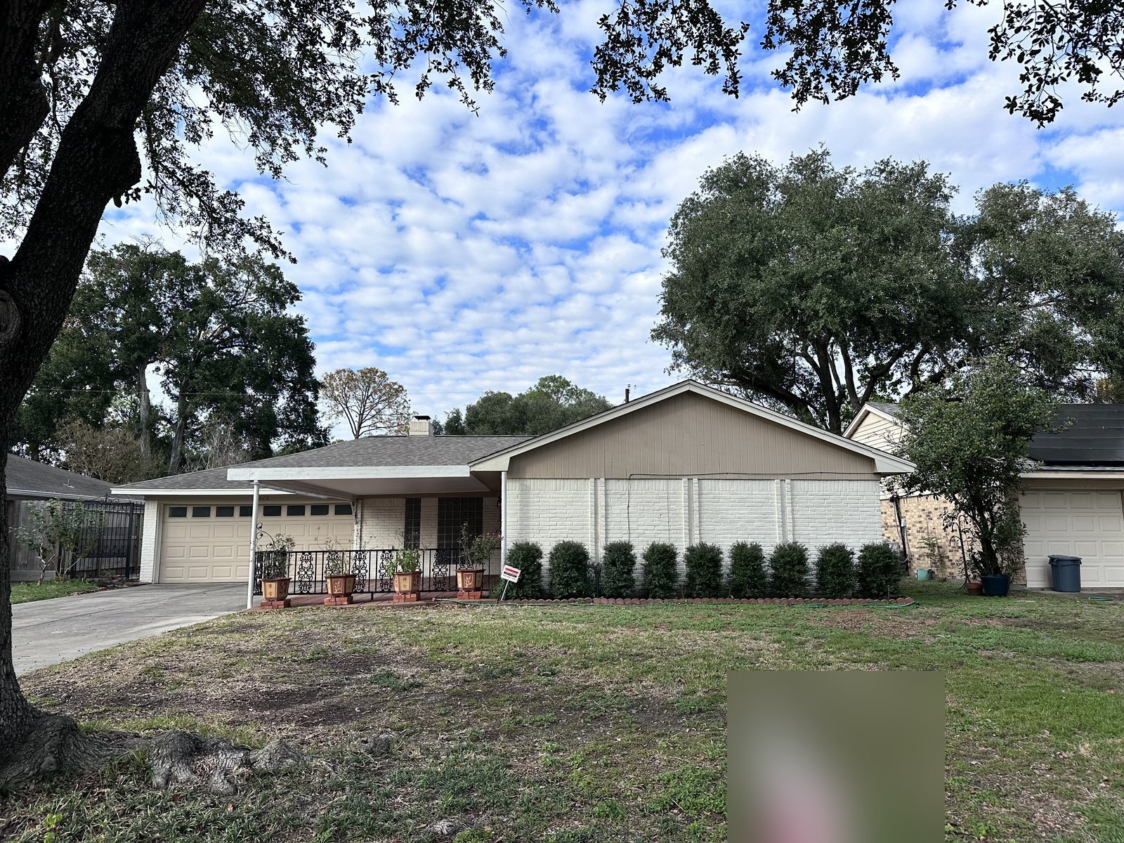 Front view of as-is home bought for cash in Memorial Grove, Houston TX