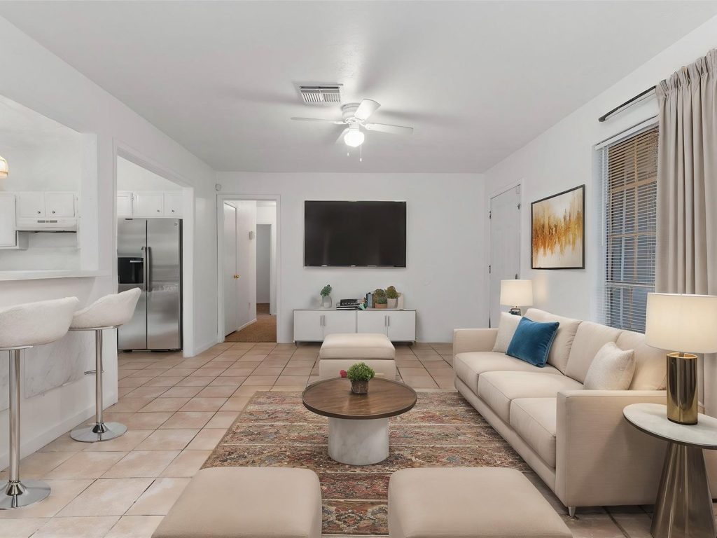 Staged living room in a Ridgemont, Missouri City TX home sold for cash