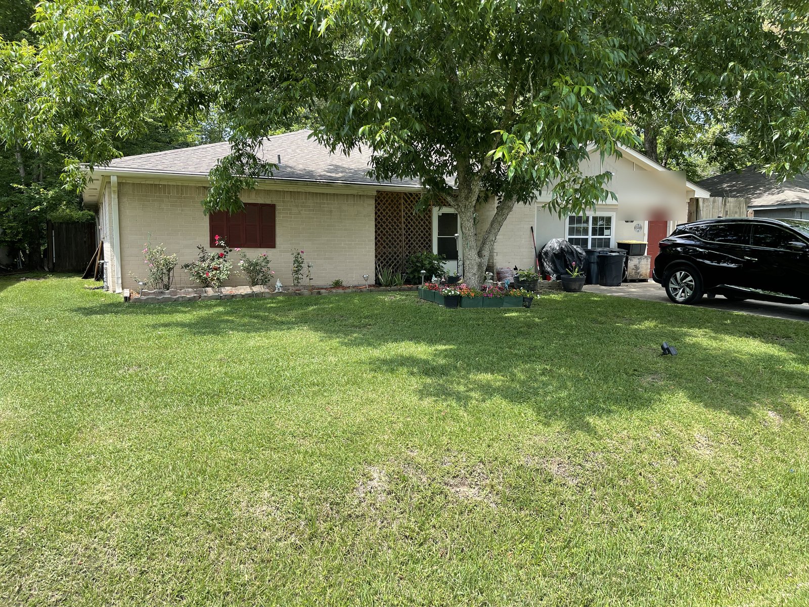 Front elevation of a Rolling Hills home in East Houston, TX sold before foreclosure