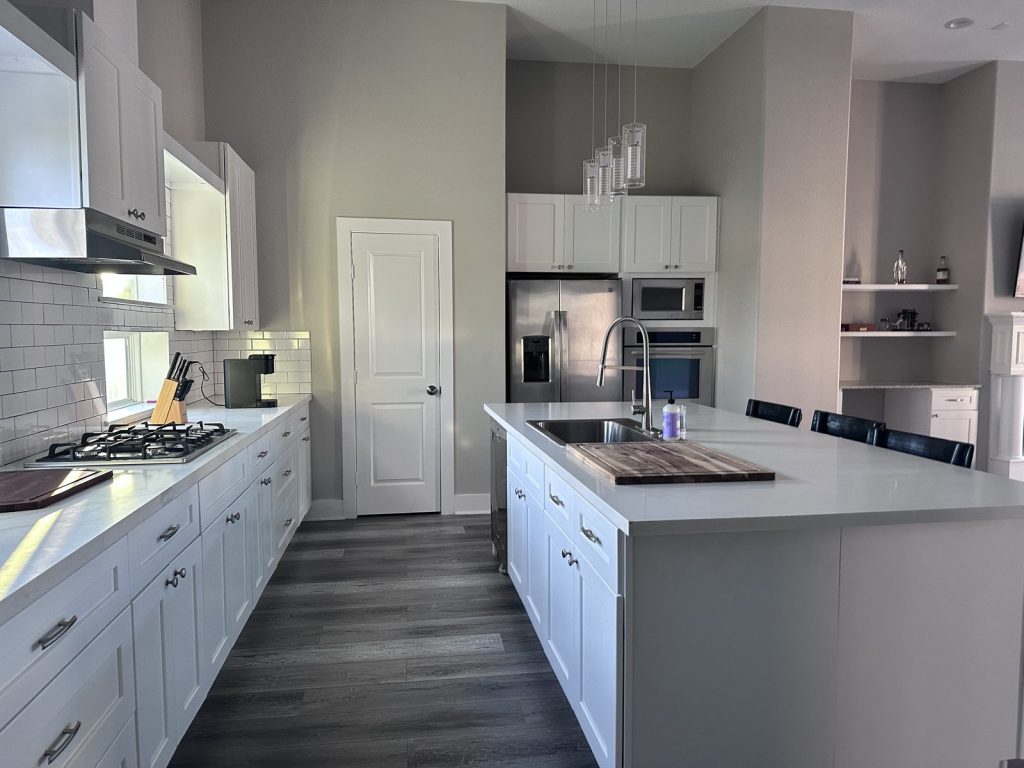 Modern kitchen inside an Oak Forest, Houston home sold discreetly during a divorce