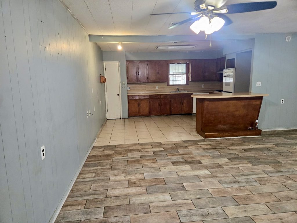 Dated kitchen in a distressed rental property purchased for cash in East Houston, TX