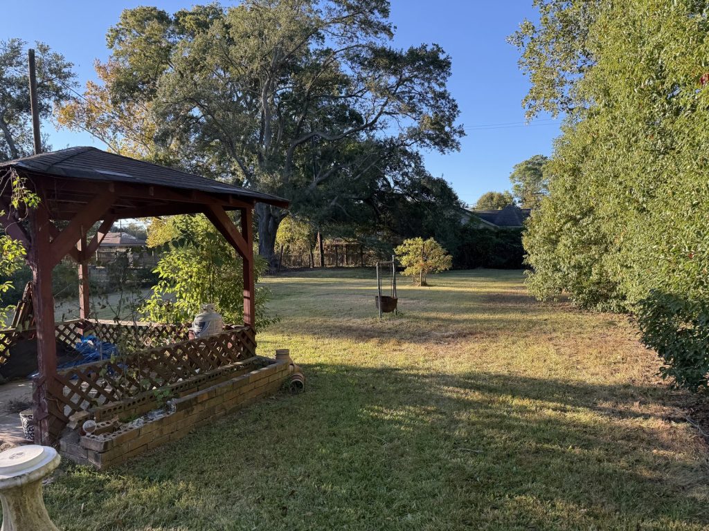 Backyard of a tired-landlord rental sold for cash in East Houston, TX