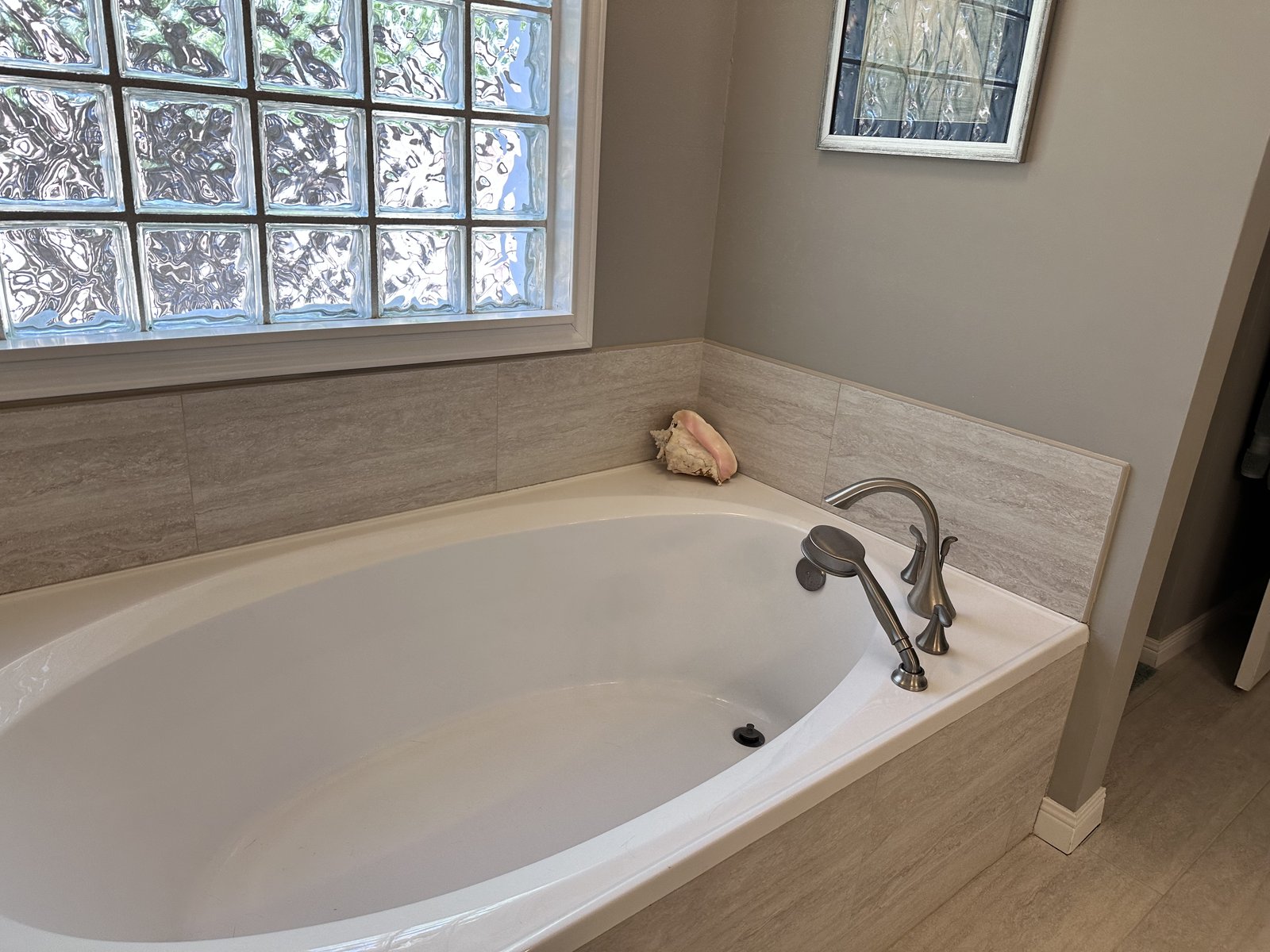 Primary bathroom garden tub in Briar Forest townhouse bought for cash in Houston TX