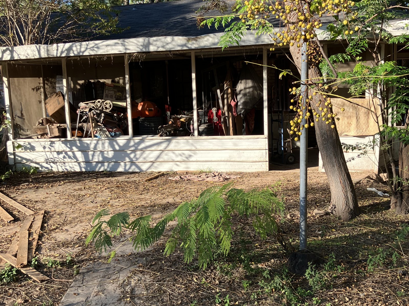 Enclosed back porch of a Tower Oaks, Cypress TX home purchased for cash
