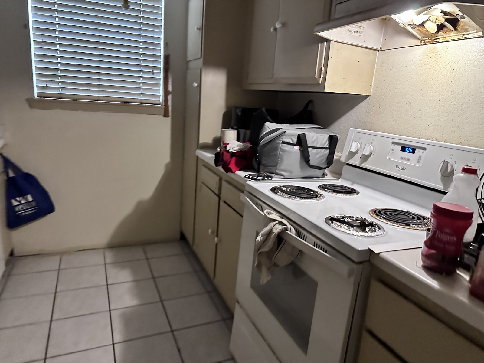 Kitchen in an occupied Chasewood Drive home in Missouri City, TX sold for cash