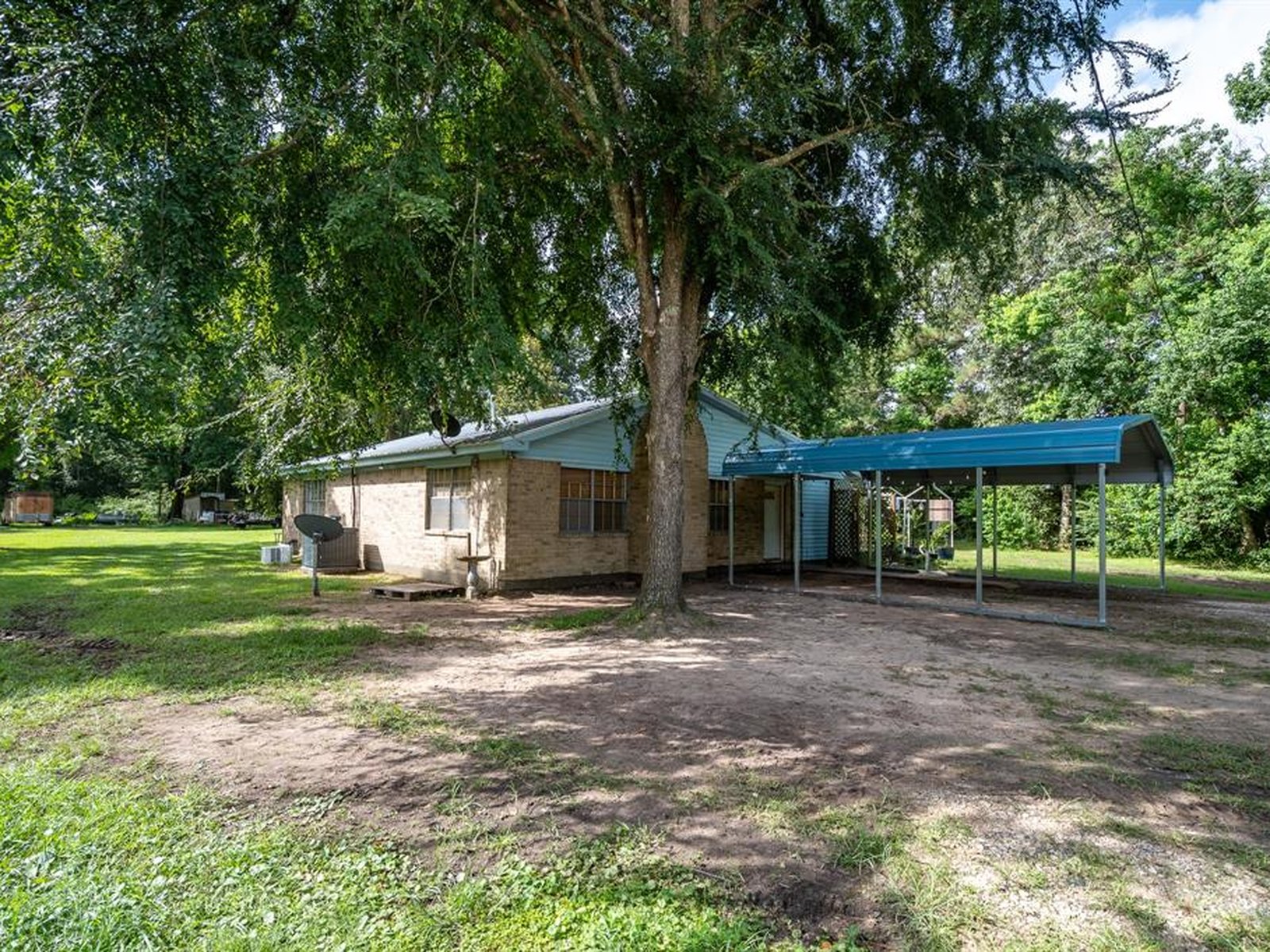 Vacant home on 7 acres in Cleveland, TX purchased for cash by Volcan Property Buyers