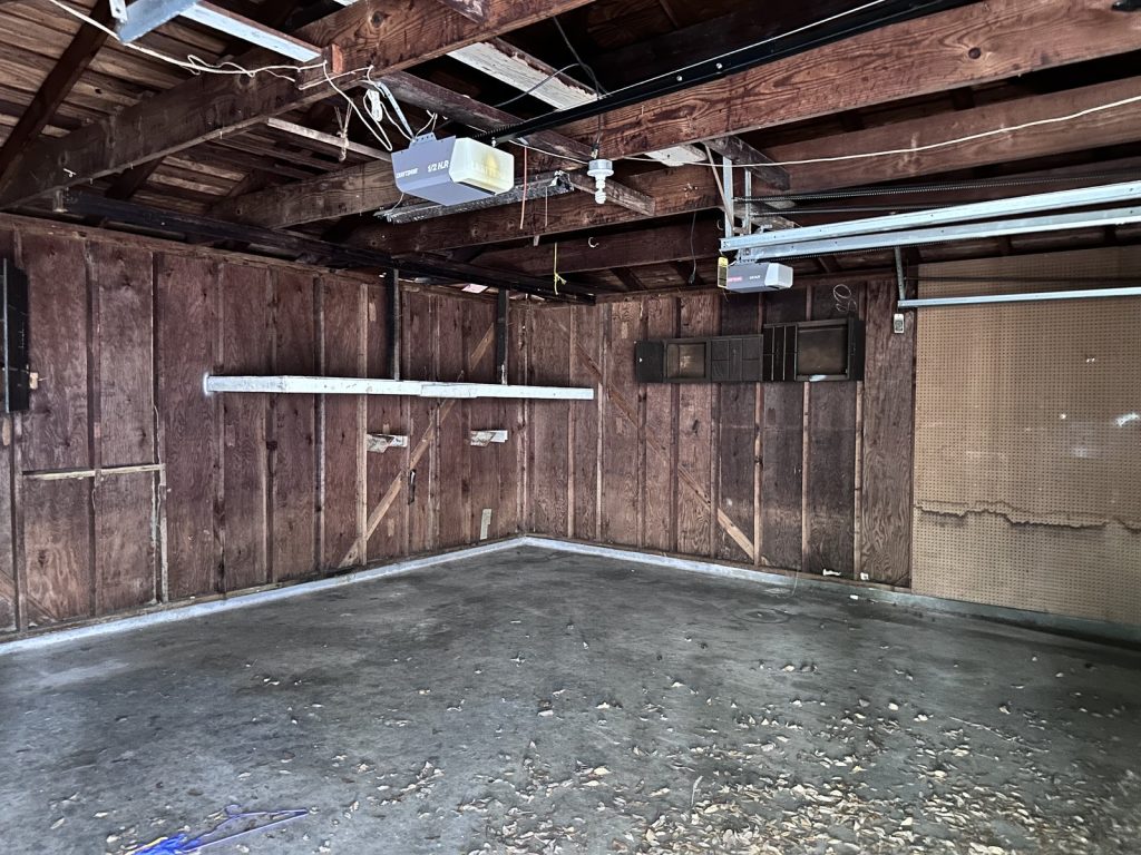 Garage interior at a Greater Inwood, Houston property purchased for cash