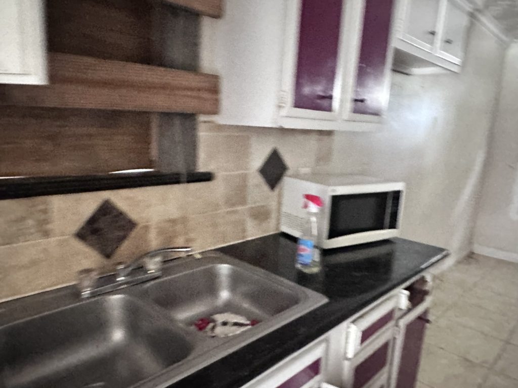 Kitchen inside a Willowood, Houston heirship property sold as-is