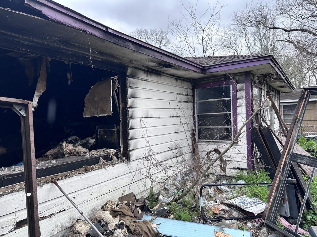 Severe fire damage on as-is home purchased by cash home buyers in Houston TX