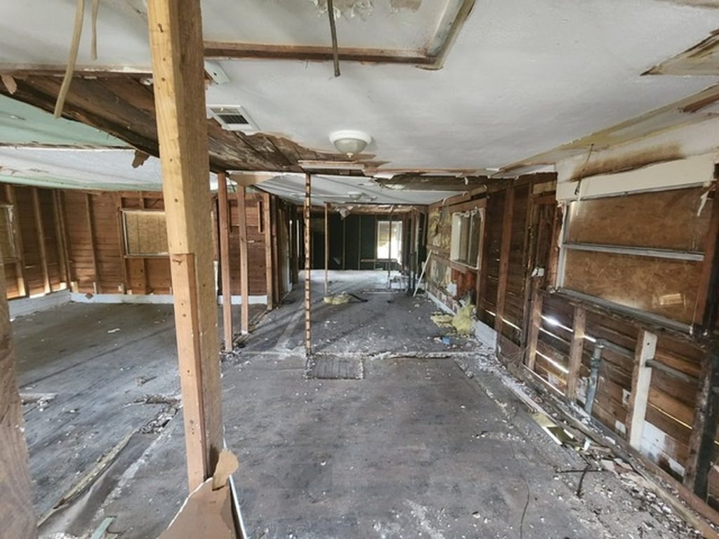 Gutted interior of a distressed property purchased for cash in Independence Heights, Houston, TX
