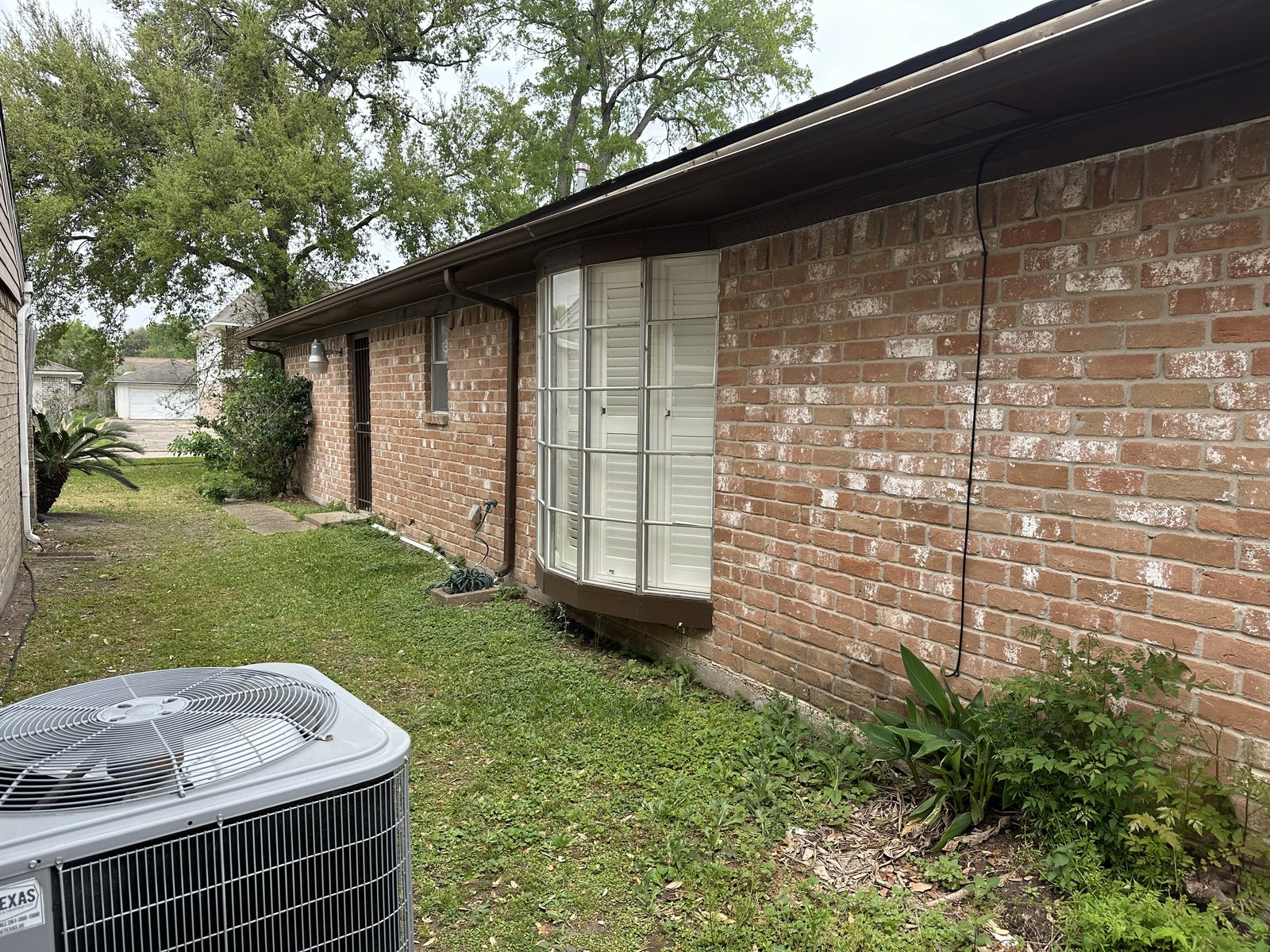 Front view of as-is home bought for cash in Brays Oaks, Houston TX