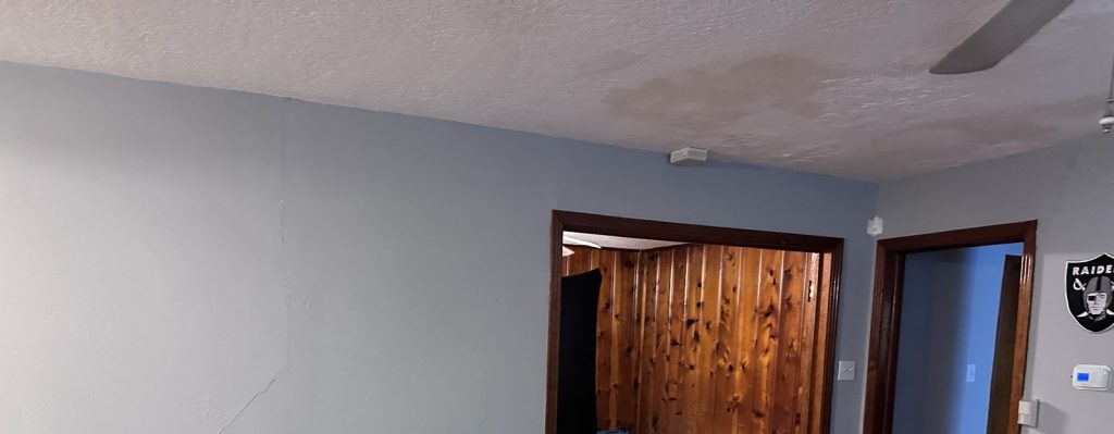 Wall crack and ceiling water stain in Britton Cravens, Baytown TX home sold for cash