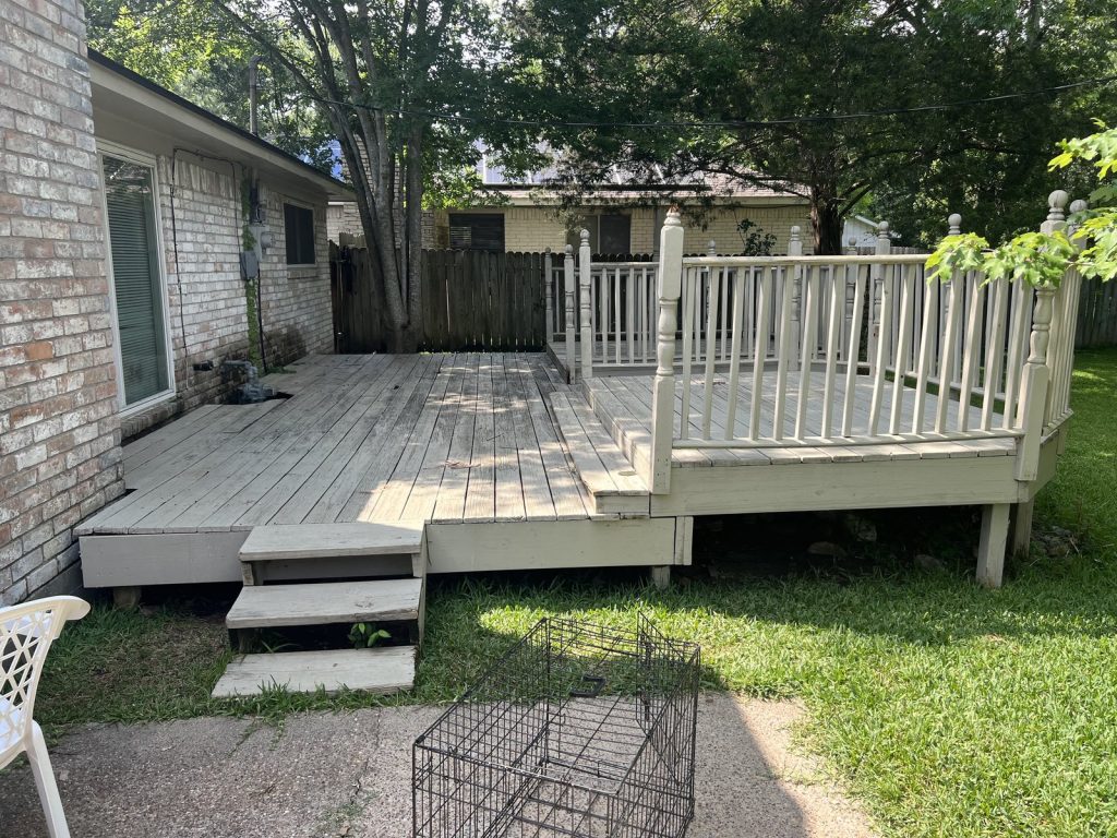 Backyard deck at a Timber Lane home in Spring, TX purchased for cash