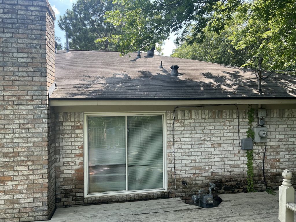 Exterior brick and roofline at a Timber Lane home in Spring, TX sold for cash