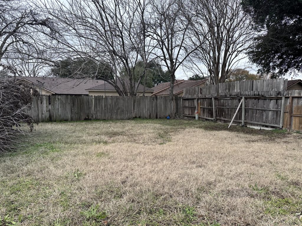 Backyard of a storm-damaged Inwood Estates, Houston property sold for cash