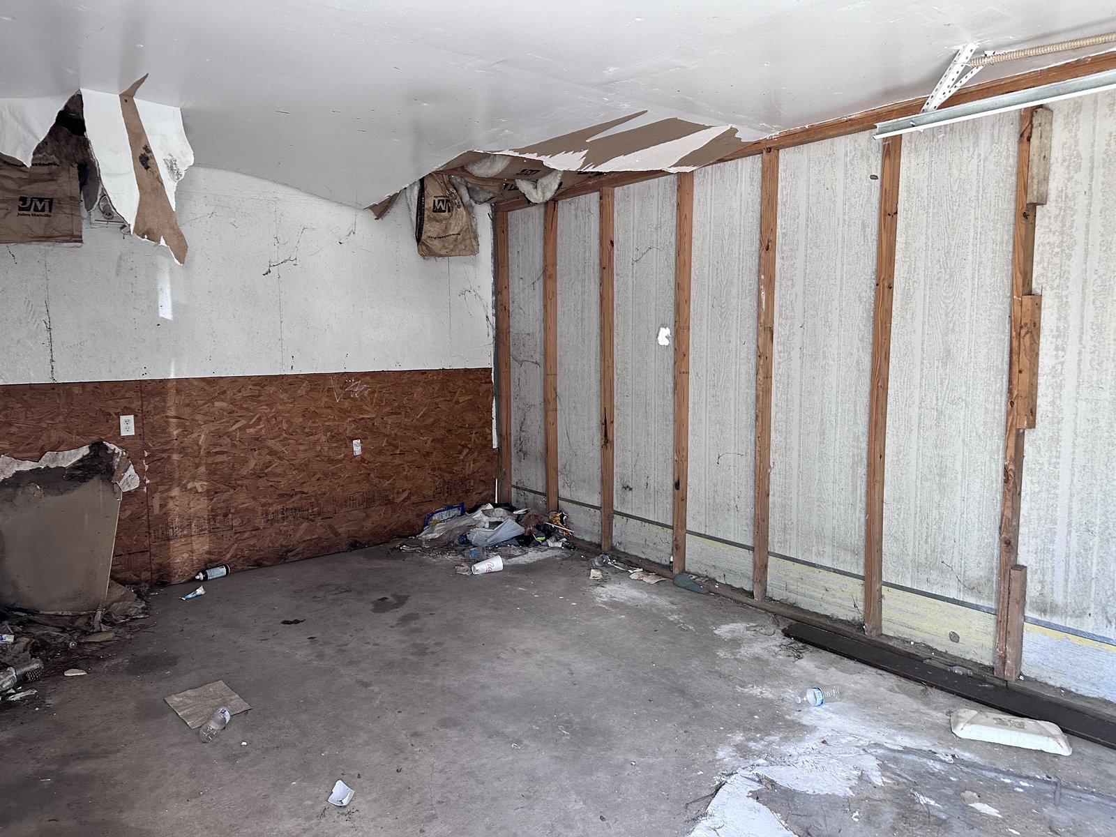 Interior damage from copper theft and vandalism inside a Greensbrook Place, Houston rental home purchased by Volcan Property Buyers