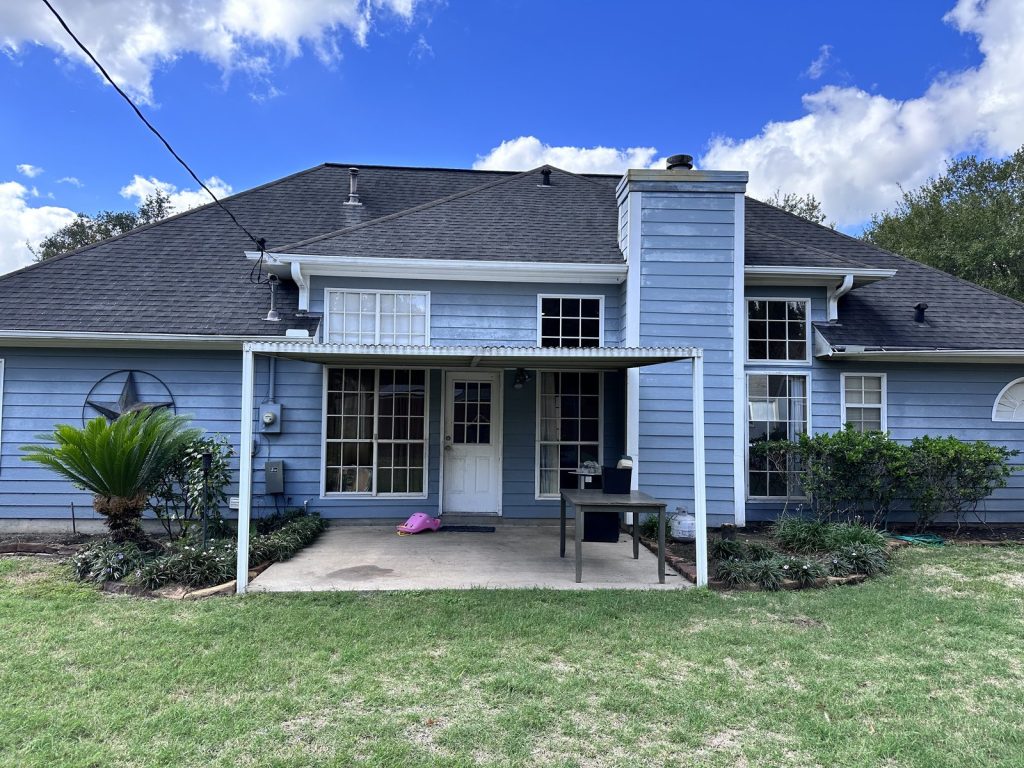 Covered back patio at a Klein Meadows home in Spring, TX sold for cash