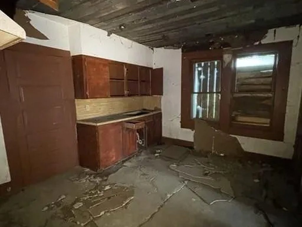 Collapsed ceiling in a vacant Fifth Ward kitchen in East Houston, TX
