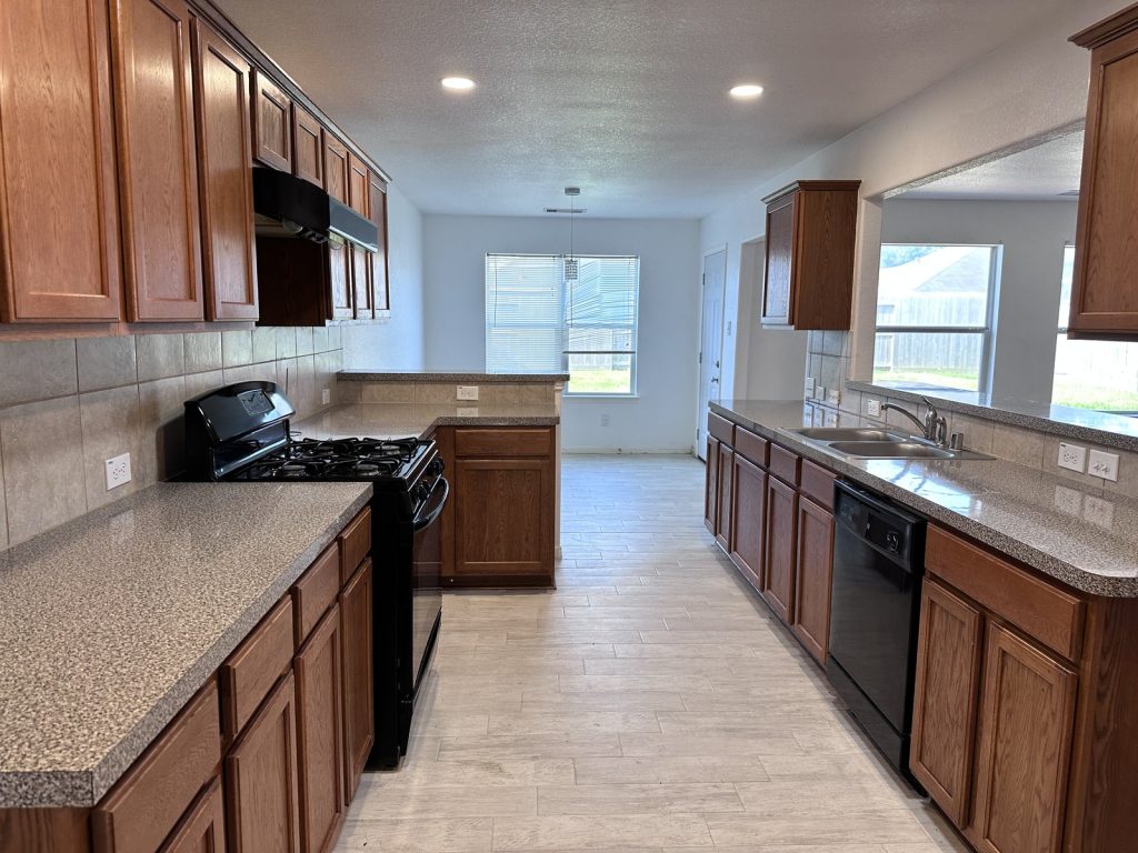 Dated kitchen in Houston TX home sold as-is for cash after months on the market