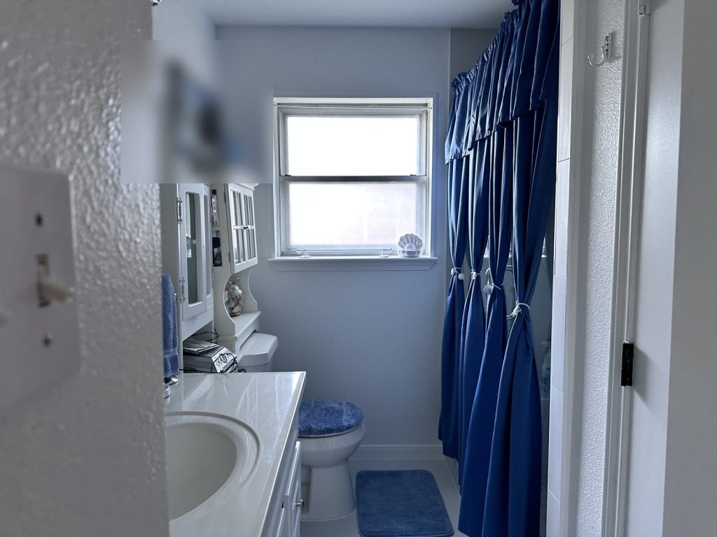 Clean bathroom in a Hockaday Drive home near Katy TX sold for cash
