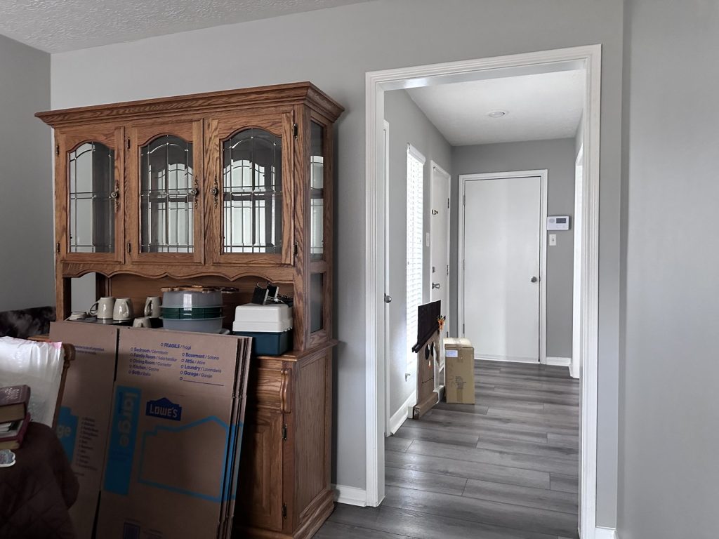 Packing boxes during a downsizing move in a Cimarron, Katy TX home