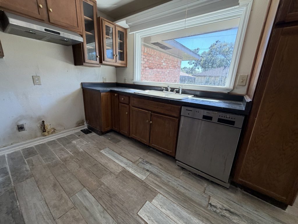 Original kitchen in as-is Sharpstown Houston TX rental purchased for cash