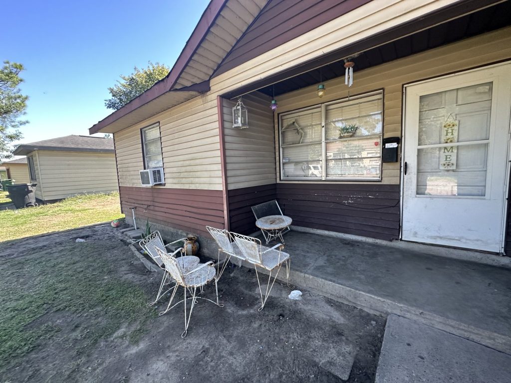Front porch at a North Shore rental home in East Houston, TX purchased for cash