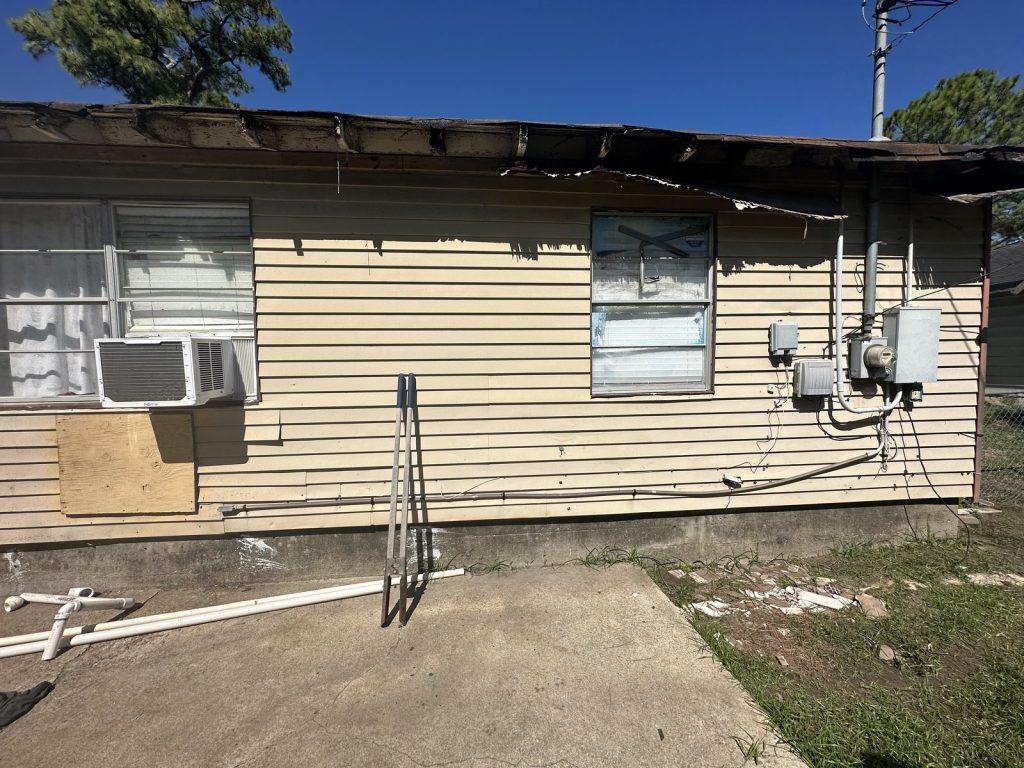 Roofline and siding damage at a North Shore rental in East Houston, TX