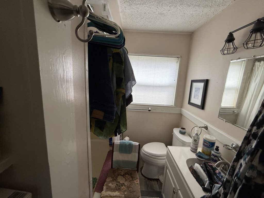 Dated bathroom in as-is house bought by Houston cash home buyers