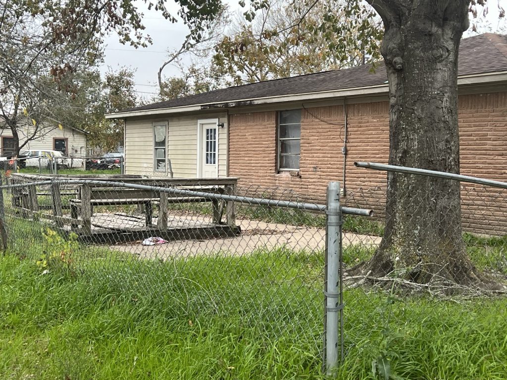 Side exterior of a vacant home near Hempstead, TX sold in a quick close