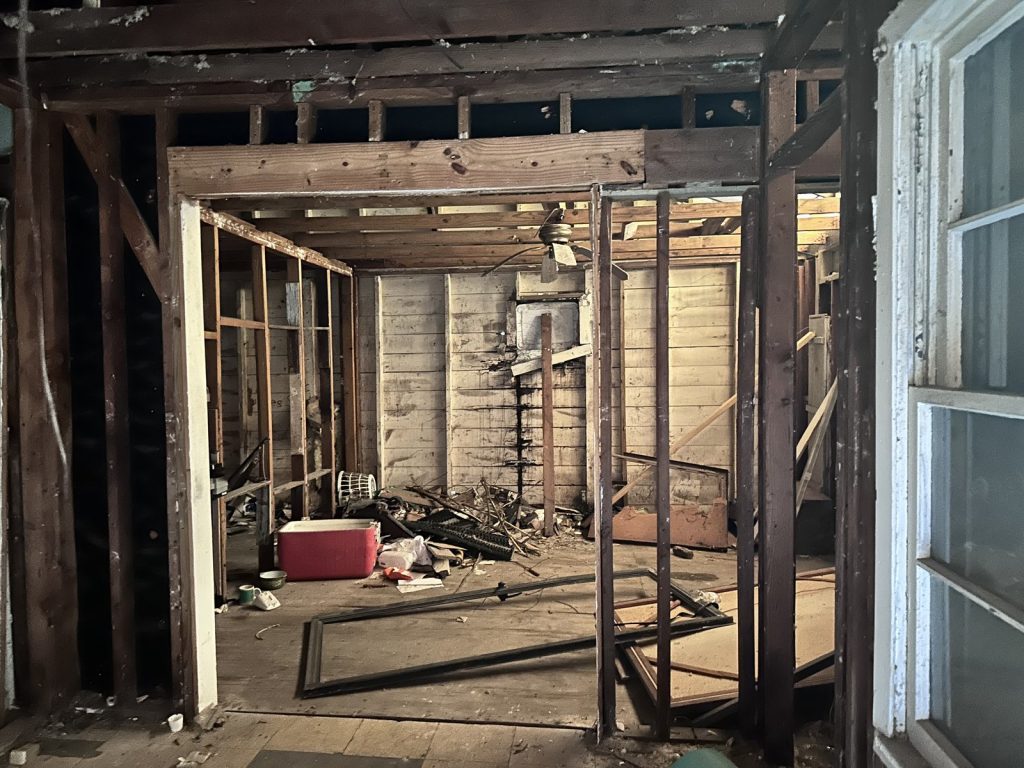 Exposed framing at a Lake Forest home in East Houston, TX purchased for cash