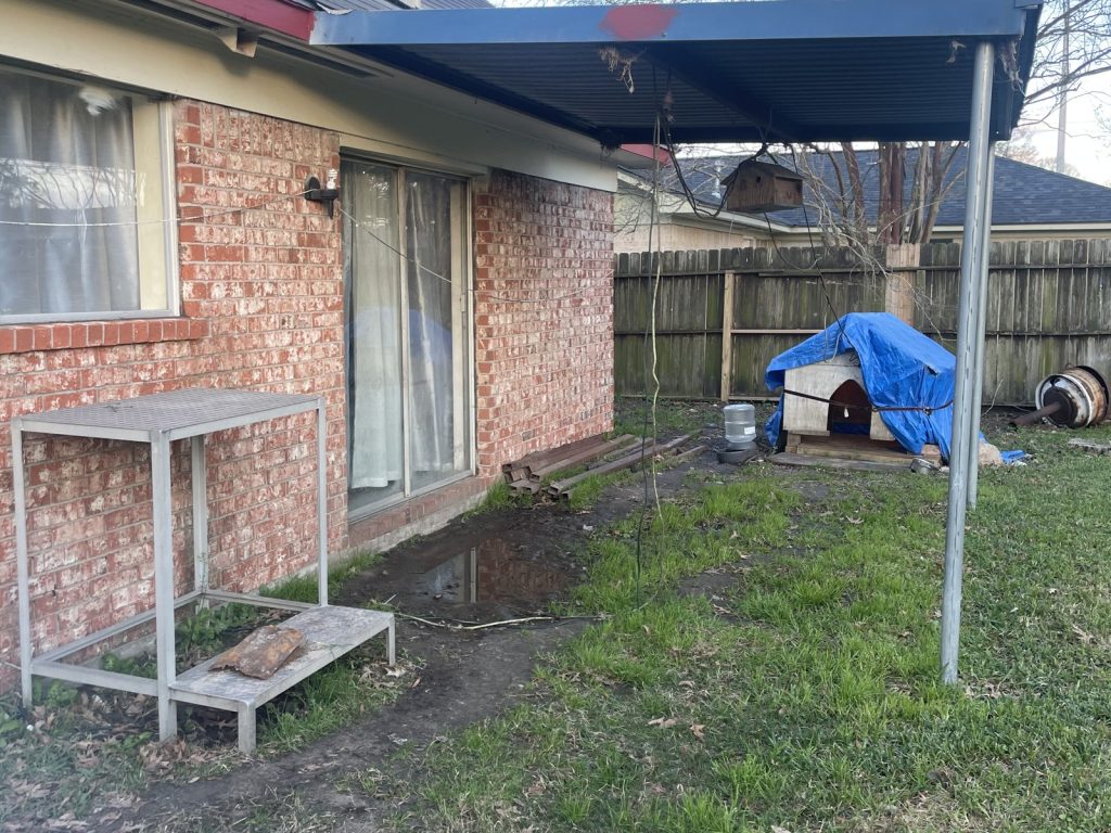 Backyard of a Channelview home sold for cash before foreclosure auction