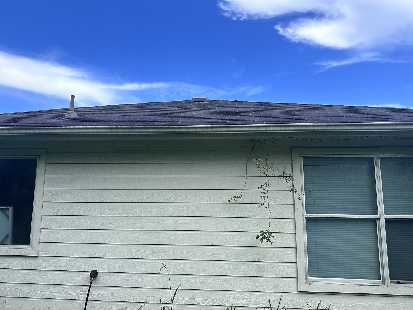 Side exterior of a Liberty Square Trail home in Teal Run, Missouri City TX