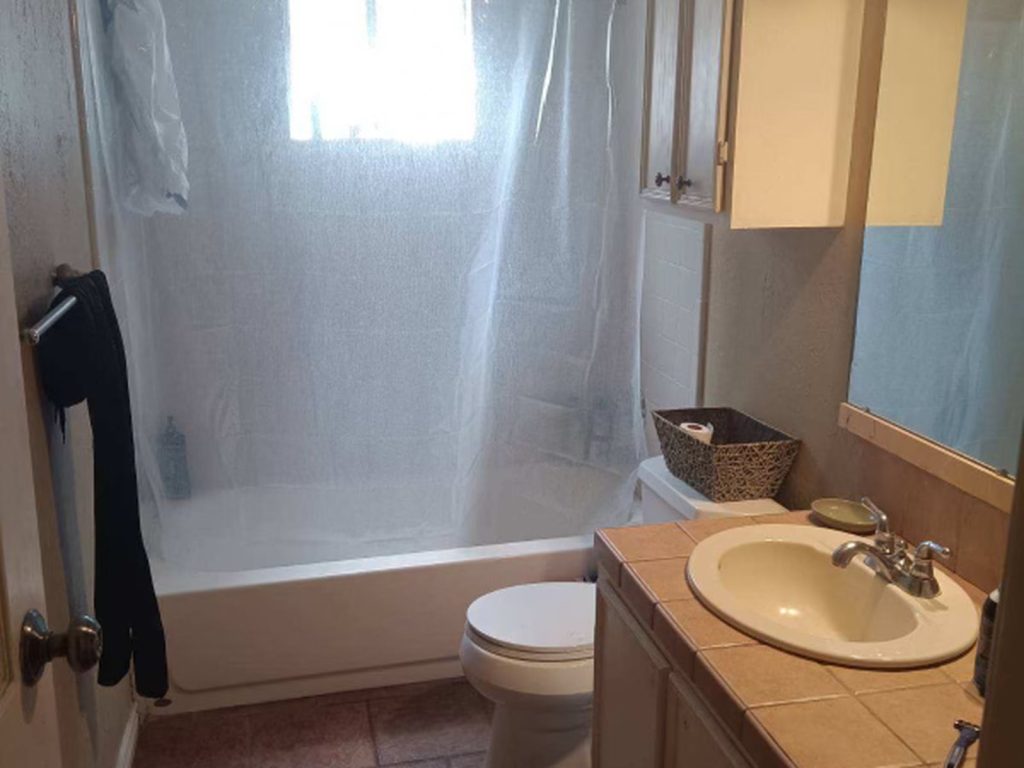 Second bathroom in a Chimney Hill, Cypress TX rental sold as-is