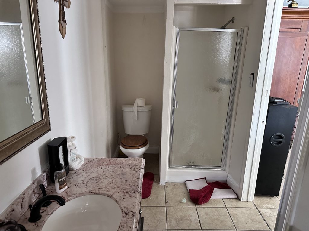 Bathroom in a home sold quietly for cash in Dayton, TX
