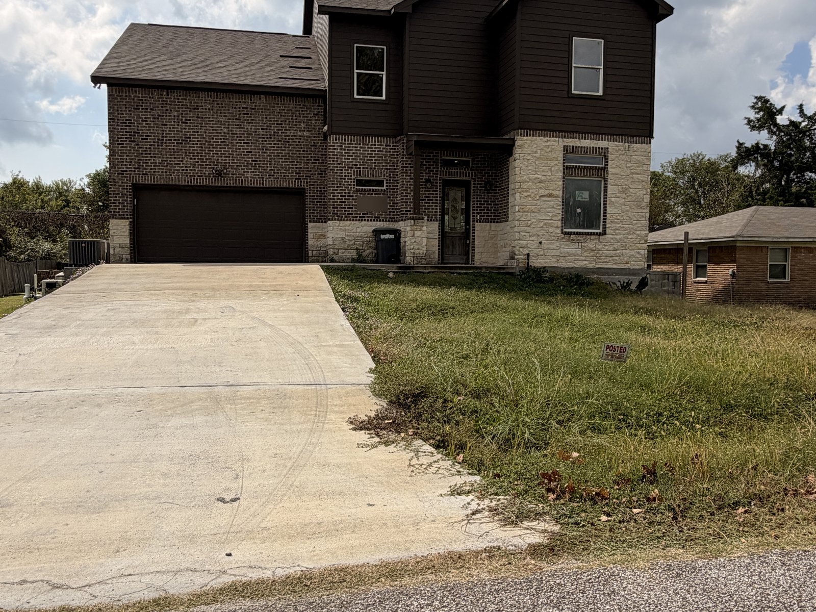 Abandoned unfinished two-story home bought for cash in Hitchcock TX