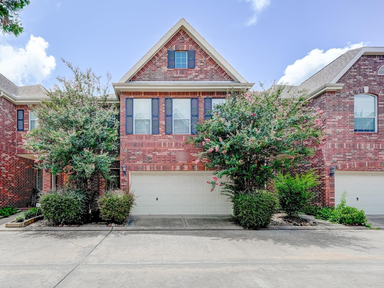 Front elevation of inherited brick home bought for cash in the Energy Corridor, Houston TX